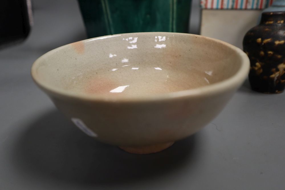 A Chinese green glazed teapot, 20.5cm high, a Cizhou type vase, a turquoise glazed vase and a Japanese tea bowl
